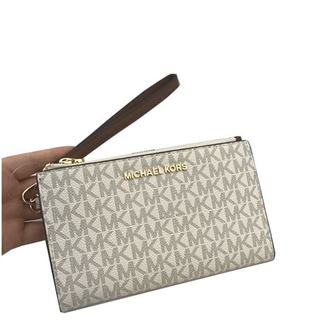 michael kors jet set double zip wallet|michael kors vanilla jet set.